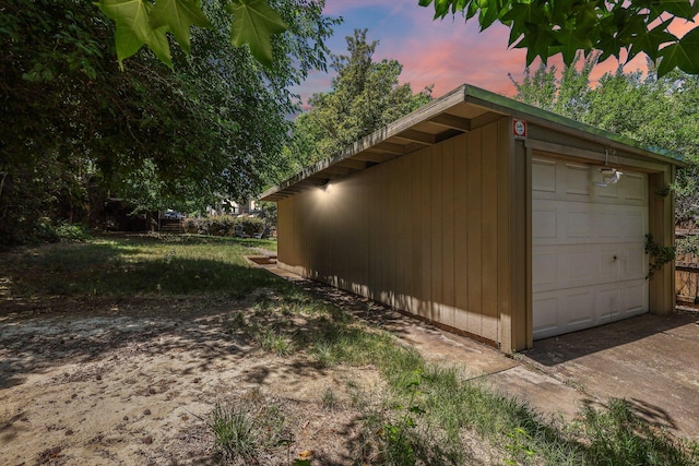 1545 Olive Ave, Redding, CA 96001 - view of side of property featuring a detached garage and an outdoor structure