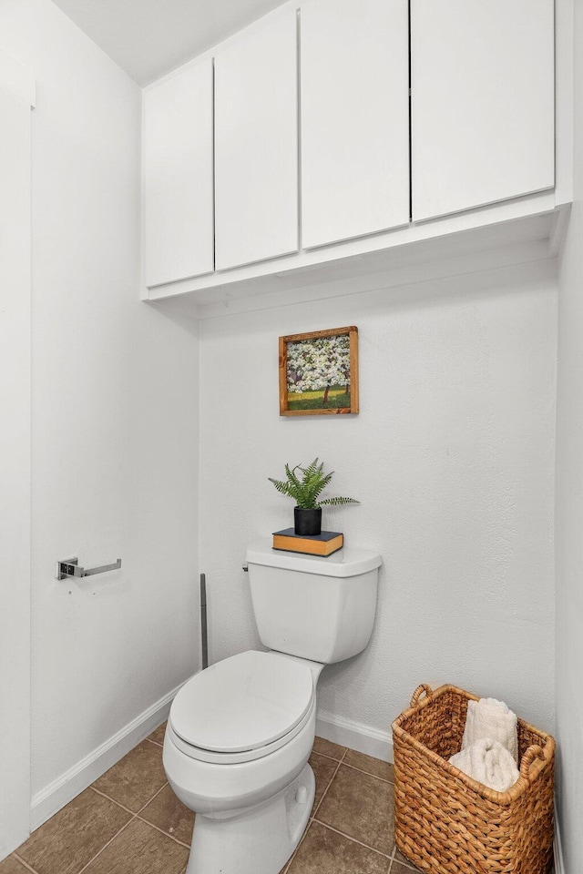 1545 Olive Ave, Redding, CA 96001 - bathroom featuring toilet and tile patterned flooring