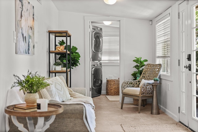 1545 Olive Ave, Redding, CA 96001 - sitting room featuring stacked washer / drying machine and light tile patterned floors