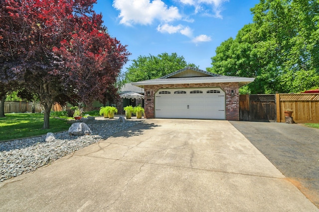 6966 Granada Dr, Redding, CA 96002 - garage with concrete driveway