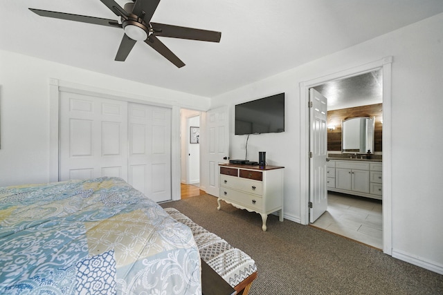 6966 Granada Dr, Redding, CA 96002 - bedroom featuring a closet, carpet flooring, connected bathroom, and a ceiling fan