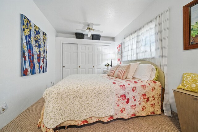 6966 Granada Dr, Redding, CA 96002 - bedroom featuring carpet flooring, a closet, and a ceiling fan