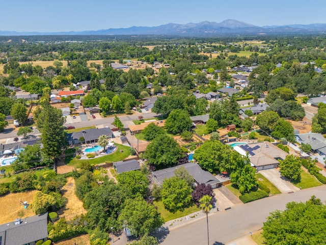 6966 Granada Dr, Redding, CA 96002 - aerial view of residential area featuring a mountainous background and a pool
