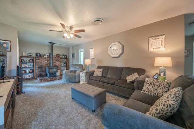 37255 Carson St, Burney, CA 96013 - carpeted living room with a wood stove and a ceiling fan