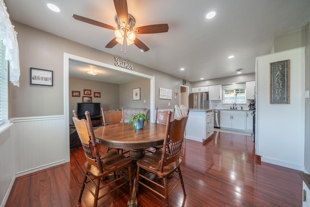 37255 Carson St, Burney, CA 96013 - dining area with dark wood finished floors, ceiling fan, wainscoting, and recessed lighting