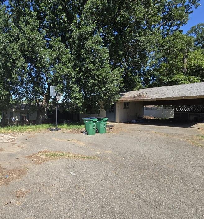 3261 Riverside Dr, Anderson, CA 96007 - view of home's exterior with asphalt driveway