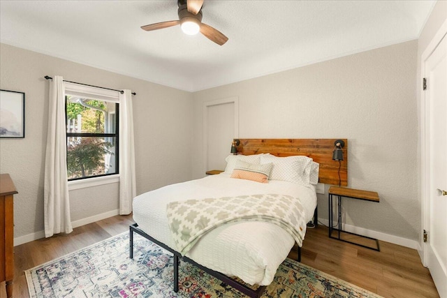 4400 Allen St, Dunsmuir, CA 96025 - bedroom featuring wood finished floors, baseboards, and a ceiling fan