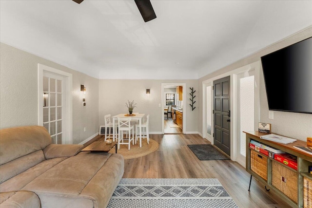 4400 Allen St, Dunsmuir, CA 96025 - living area with light wood-style flooring, ceiling fan, and baseboards