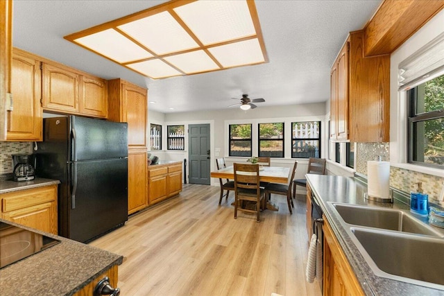 4400 Allen St, Dunsmuir, CA 96025 - kitchen featuring black appliances, a ceiling fan, healthy amount of natural light, and a sink