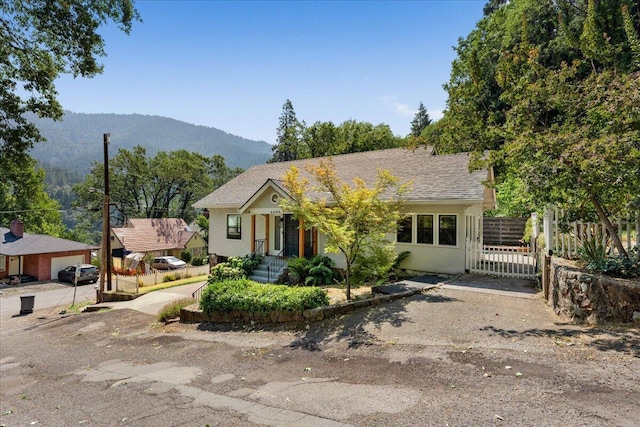 4400 Allen St, Dunsmuir, CA 96025 - view of front of house with a mountain view and stucco siding