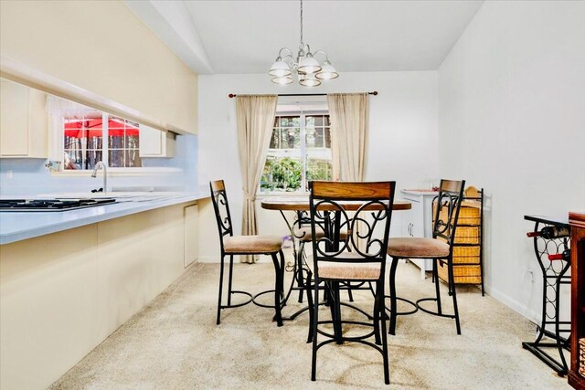 30821 Bambi Dr, Shingletown, CA 96088 - dining room featuring a chandelier and light carpet