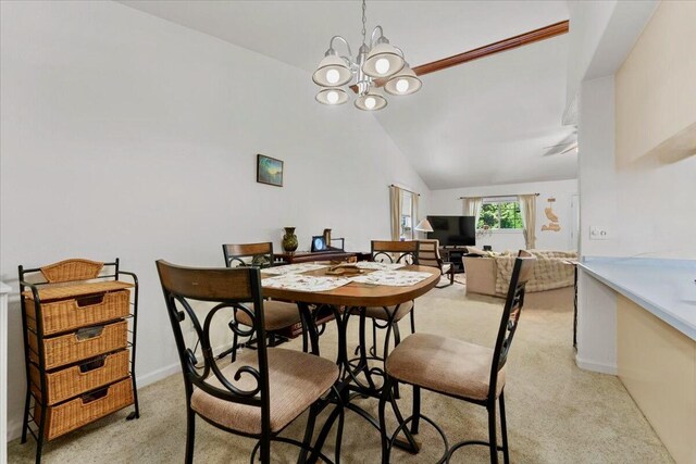 30821 Bambi Dr, Shingletown, CA 96088 - dining room featuring light carpet, a chandelier, and lofted ceiling