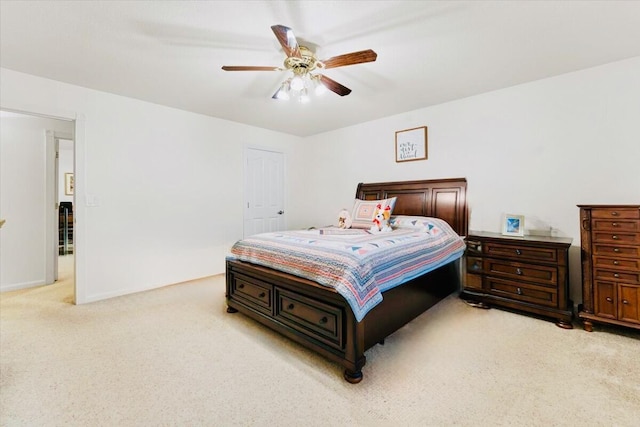 30821 Bambi Dr, Shingletown, CA 96088 - bedroom with light colored carpet and a ceiling fan