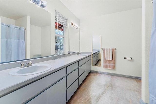 30821 Bambi Dr, Shingletown, CA 96088 - full bathroom with double vanity and baseboards