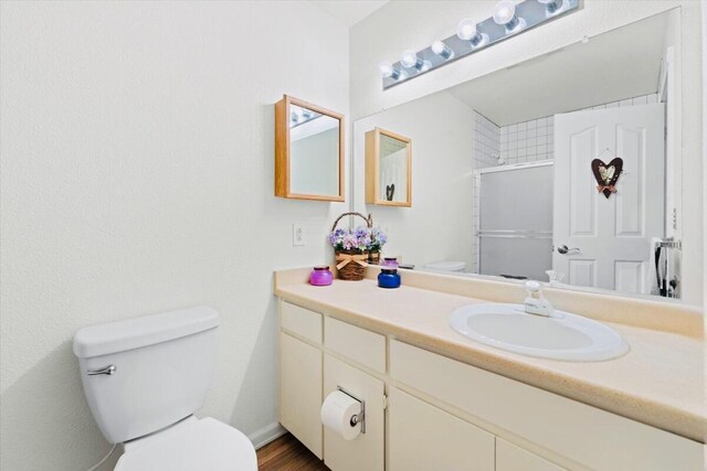 30821 Bambi Dr, Shingletown, CA 96088 - bathroom with vanity and a shower with shower door