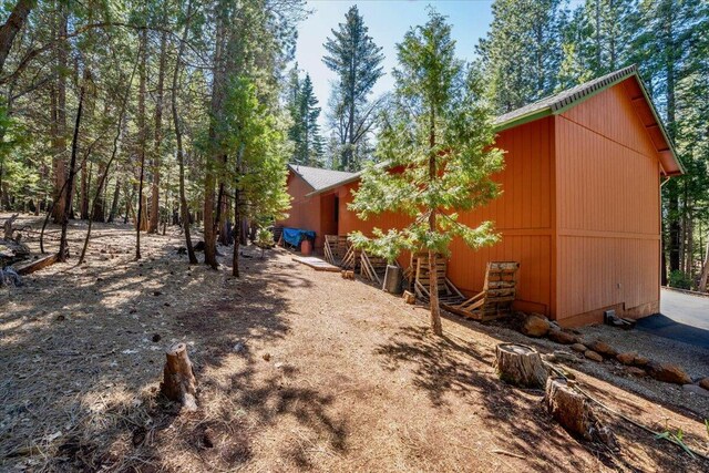 30821 Bambi Dr, Shingletown, CA 96088 - view of yard with a pole building and an outdoor structure