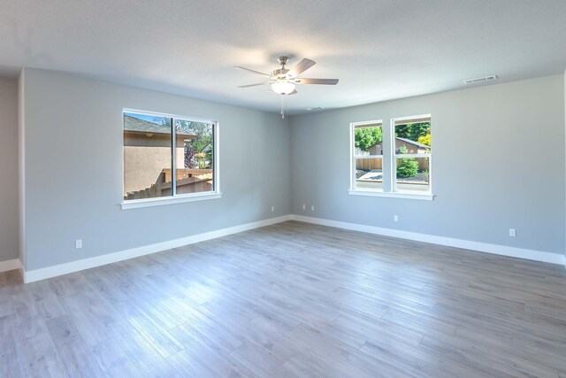 3707 Bloomsbury Ave, Shasta Lake, CA 96019 - empty room featuring ceiling fan and wood finished floors
