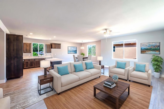 3707 Bloomsbury Ave, Shasta Lake, CA 96019 - living area with light wood finished floors, recessed lighting, and ceiling fan