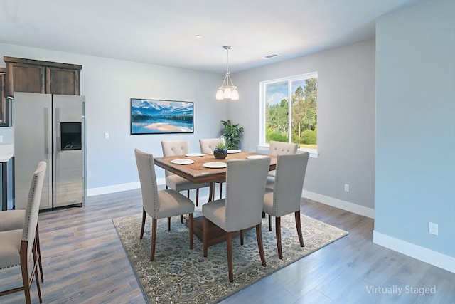 3707 Bloomsbury Ave, Shasta Lake, CA 96019 - dining room with baseboards and dark wood-style floors