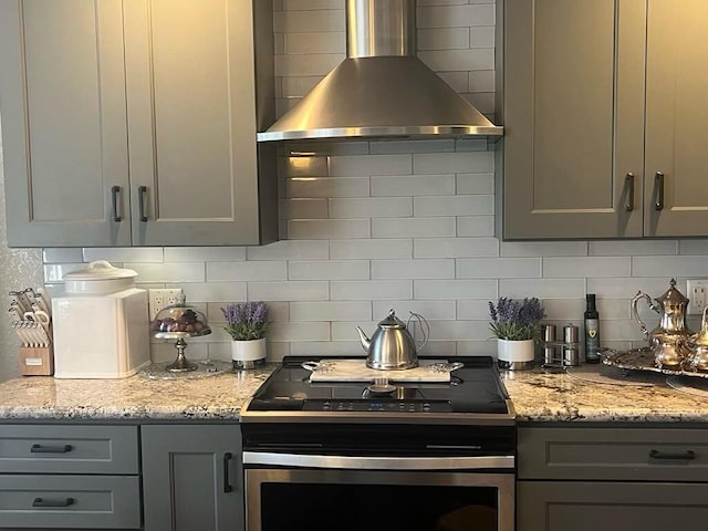 3837 Appalachian Way, Redding, CA 96001 - kitchen featuring stainless steel electric range, wall chimney exhaust hood, and gray cabinets