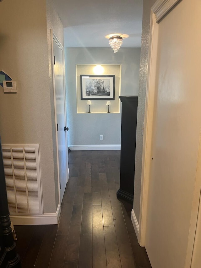 3837 Appalachian Way, Redding, CA 96001 - corridor with dark wood finished floors and baseboards