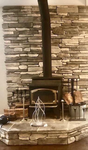 3837 Appalachian Way, Redding, CA 96001 - detailed view of a wood stove