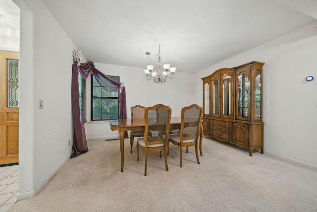 2173 Oak Ridge Dr, Redding, CA 96001 - dining area with a chandelier and carpet floors
