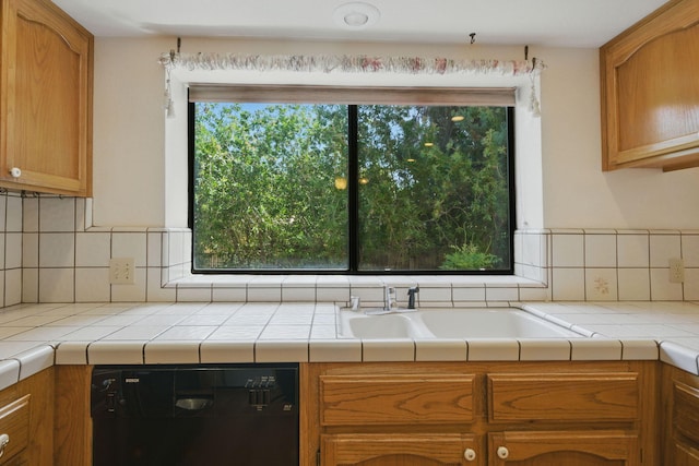 2173 Oak Ridge Dr, Redding, CA 96001 - kitchen featuring dishwasher, decorative backsplash, brown cabinetry, and tile countertops