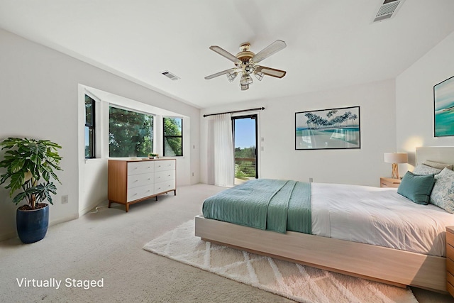 2173 Oak Ridge Dr, Redding, CA 96001 - bedroom with access to outside, carpet, and ceiling fan