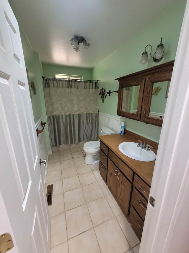 37023 Park Ave, Burney, CA 96013 - bathroom with wainscoting, vanity, tile patterned floors, and a shower with curtain