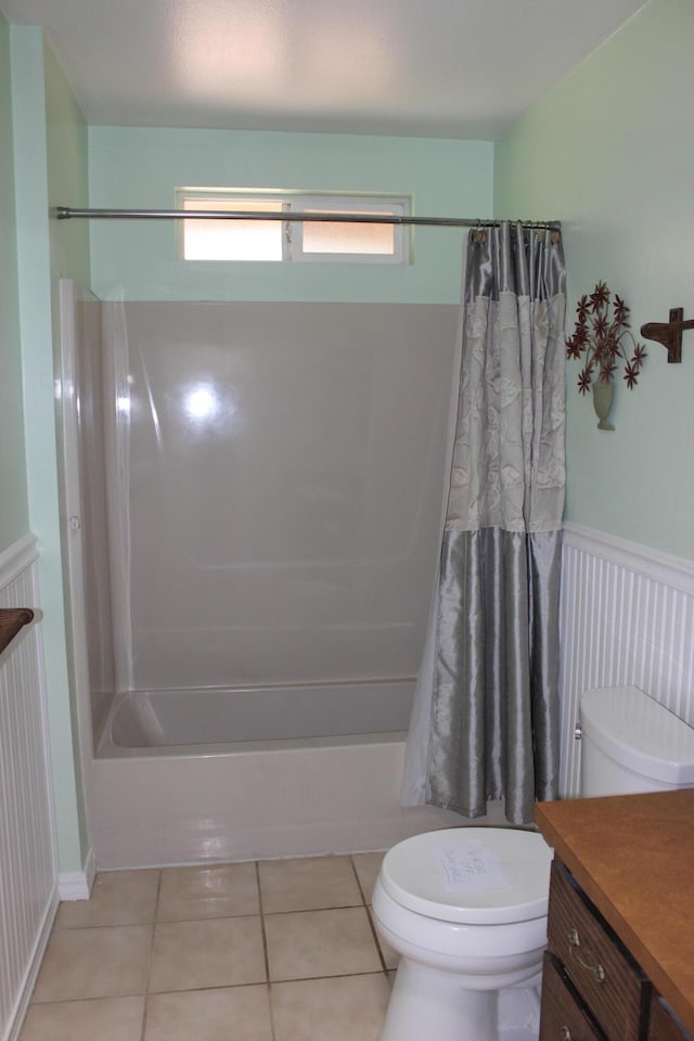 37023 Park Ave, Burney, CA 96013 - full bathroom featuring shower / bath combo with shower curtain, vanity, tile patterned flooring, and a wainscoted wall