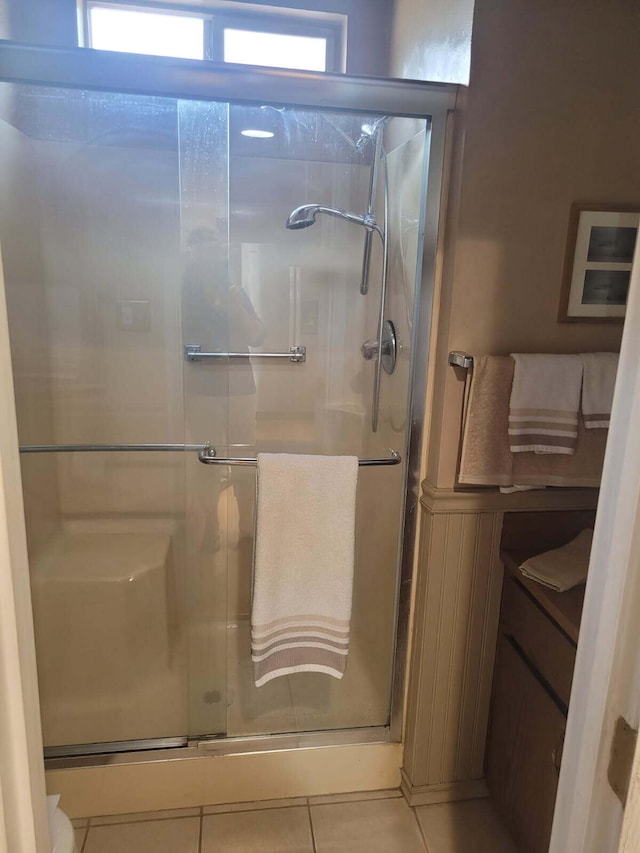 37023 Park Ave, Burney, CA 96013 - full bathroom featuring tile patterned floors and a stall shower