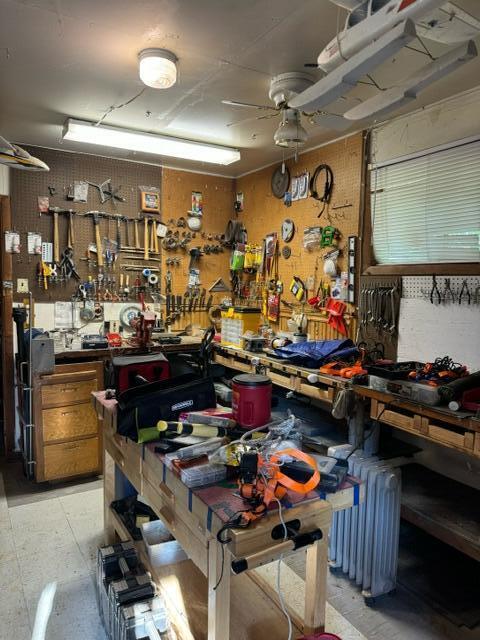 37023 Park Ave, Burney, CA 96013 - miscellaneous room with a workshop area and radiator
