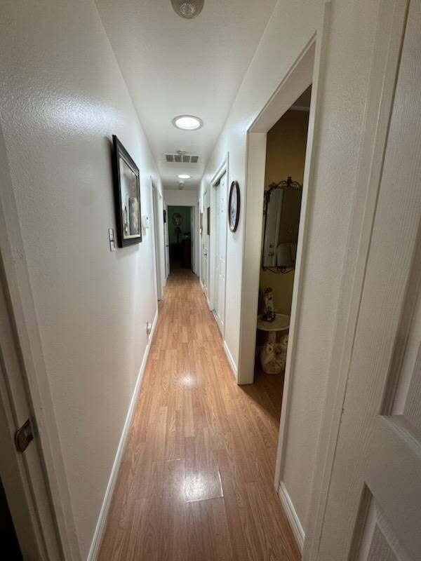 37023 Park Ave, Burney, CA 96013 - corridor featuring light wood finished floors and baseboards