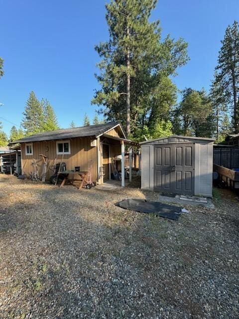 37023 Park Ave, Burney, CA 96013 - rear view of property with a storage unit