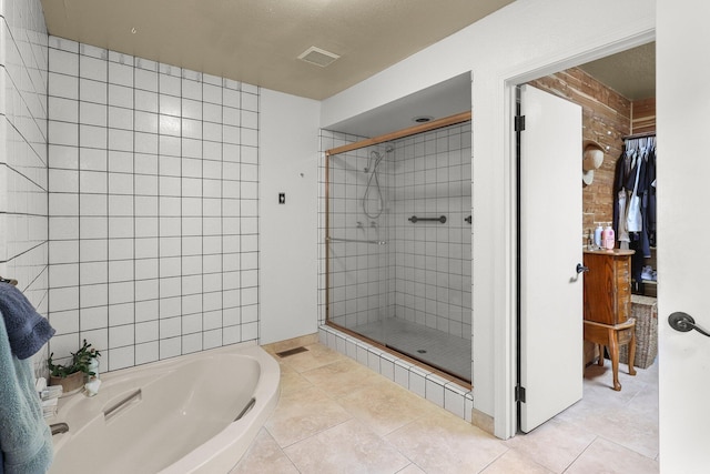 409 Ridgecrest Trl, Redding, CA 96003 - full bathroom featuring a shower stall, tile patterned flooring, and a garden tub