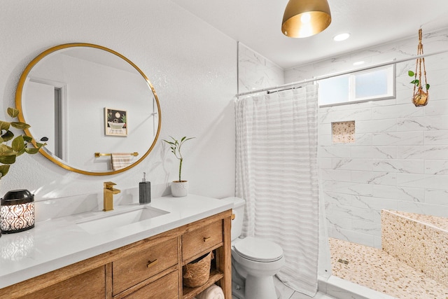 409 Ridgecrest Trl, Redding, CA 96003 - bathroom featuring vanity, a tile shower, and marble look tiles