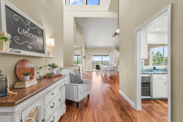 409 Ridgecrest Trl, Redding, CA 96003 - hall featuring wine cooler and wood-type flooring
