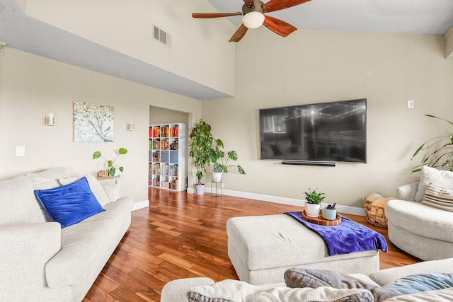 409 Ridgecrest Trl, Redding, CA 96003 - living room featuring a ceiling fan, wood finished floors, and high vaulted ceiling