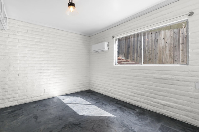 2955 Shasta St, Redding, CA 96001 - empty room featuring a wall mounted air conditioner, unfinished concrete flooring, and crown molding