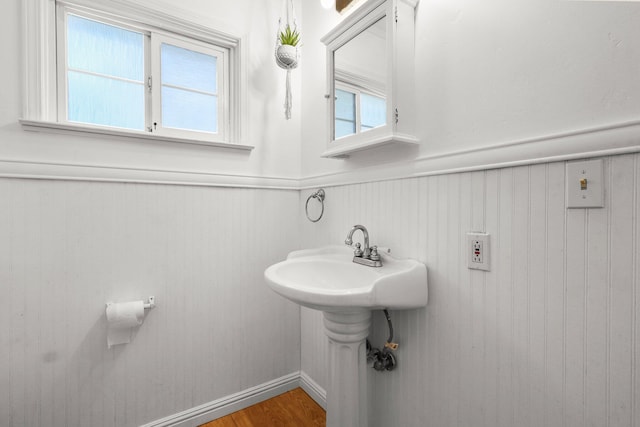 2955 Shasta St, Redding, CA 96001 - bathroom with wainscoting, plenty of natural light, and wood finished floors
