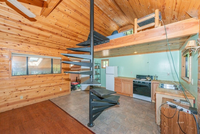 11221 Corral Bottom Rd, Big Bar, CA 96010 - kitchen with white appliances, a sink, high vaulted ceiling, wooden ceiling, and wooden walls
