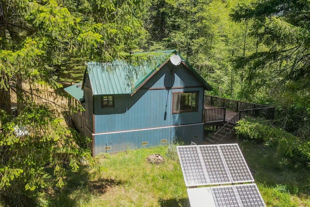 11221 Corral Bottom Rd, Big Bar, CA 96010 - view of property exterior with crawl space, stairway, a wooded view, and a deck