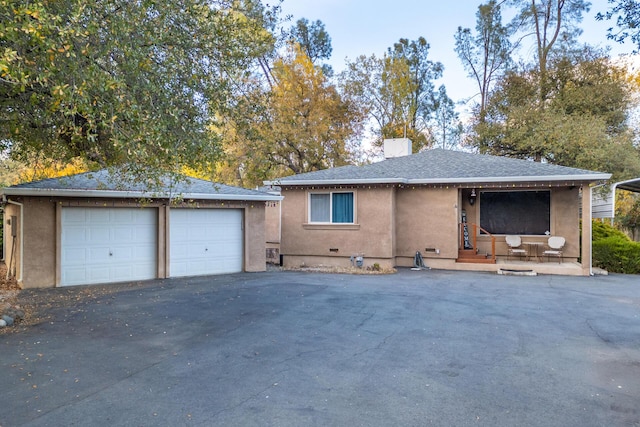 3274 Quartz Hill Rd, Redding, CA 96003 - view of front facade with a garage, an outdoor structure, stucco siding, a shingled roof, and a chimney