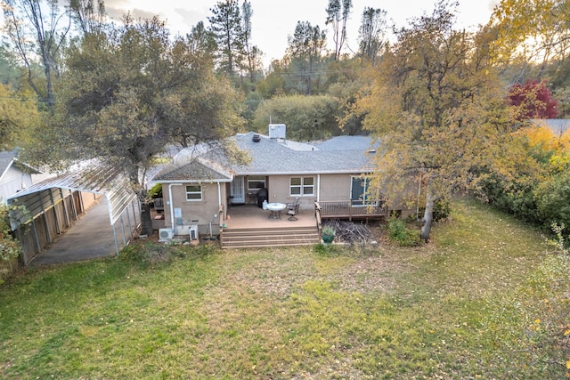 3274 Quartz Hill Rd, Redding, CA 96003 - rear view of property featuring a yard, a wooden deck, stucco siding, roof with shingles, and a chimney