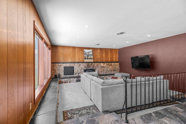 3371 Bardick Rd, Anderson, CA 96007 - living room with wooden walls, recessed lighting, and a stone fireplace