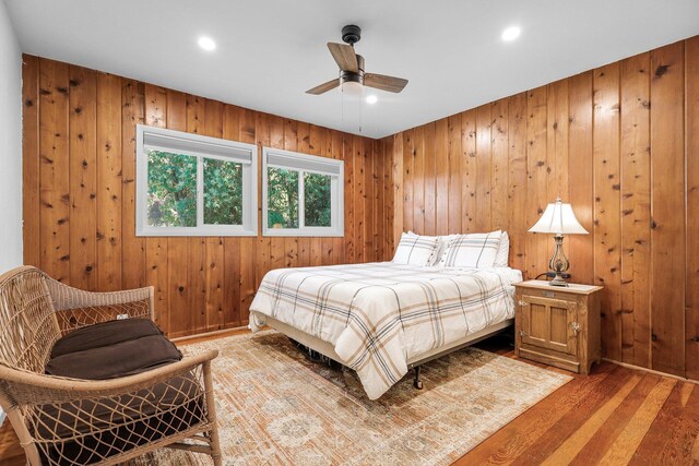 3371 Bardick Rd, Anderson, CA 96007 - bedroom with light wood-type flooring, wooden walls, recessed lighting, and ceiling fan