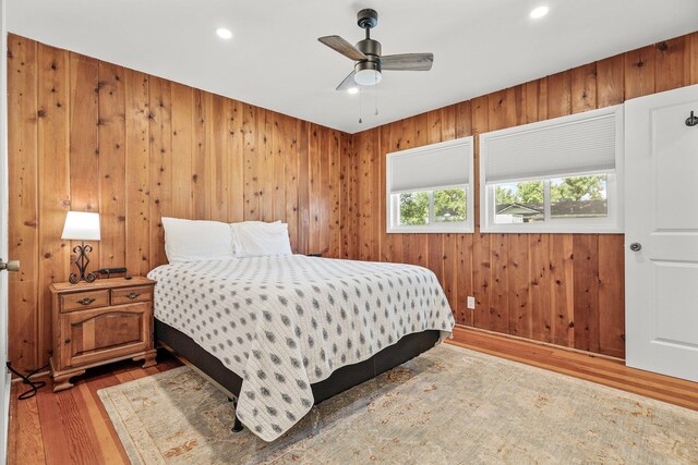 3371 Bardick Rd, Anderson, CA 96007 - bedroom featuring light wood-type flooring, recessed lighting, wood walls, and ceiling fan