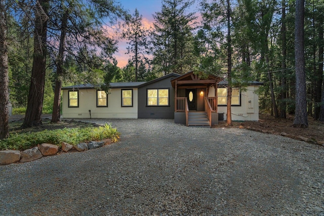 7727 Pegnan Rd, Shingletown, CA 96088 - view of front of home featuring gravel driveway and crawl space