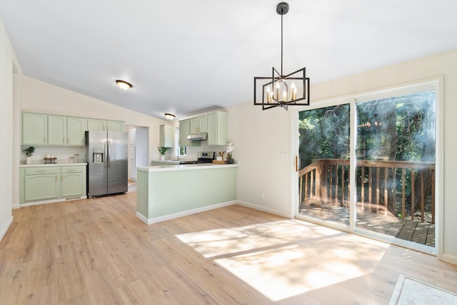 7727 Pegnan Rd, Shingletown, CA 96088 - kitchen with appliances with stainless steel finishes, green cabinets, a peninsula, a chandelier, and light wood-style floors
